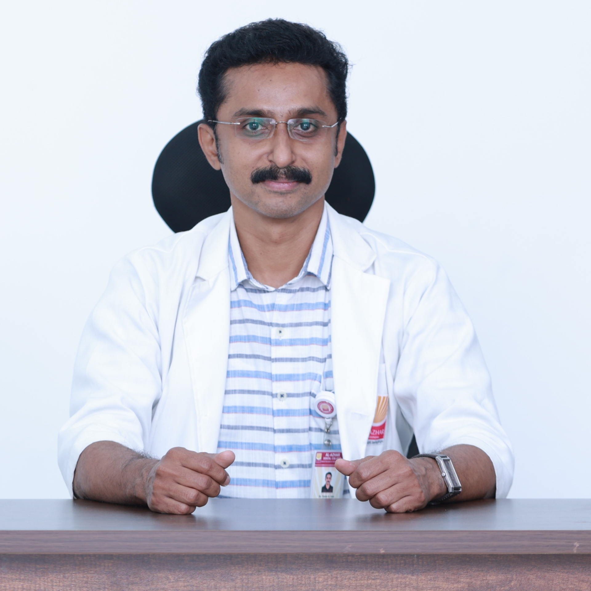 Dr. Nishin K John